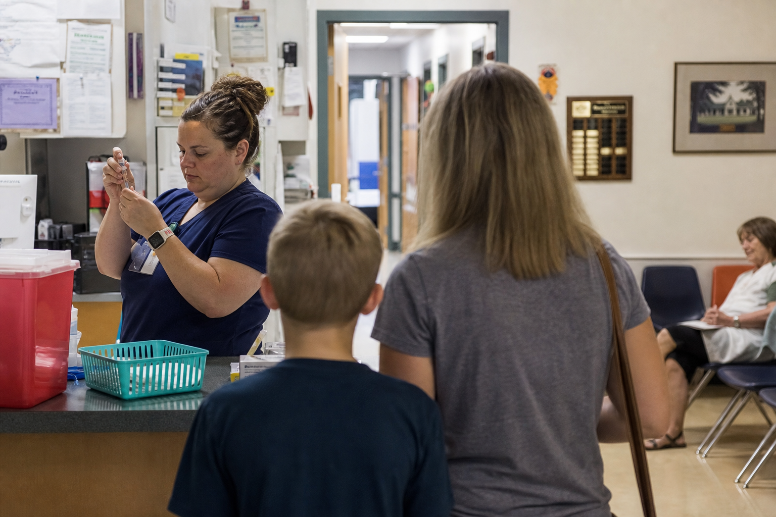 A county clinic prepares measles vaccinations as Wisconsin traces a growing outbreak in Iowa and Lafayette counties.
